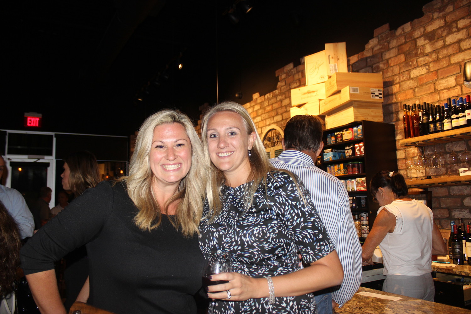 Sarah McKeown and Megan Kennedy gather at a fundraiser held at Coastal Wine Market in Nocatee on Oct. 1 supporting the Alzheimer's Association’s 2018 Walk to End Alzheimer’s in Jacksonville.